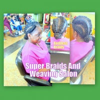 Photo taken at Super Braids and Weaving Salon by Betty B. on 11/19/2014