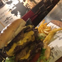 Photo taken at Holy Cow Gourmet Burgers &amp;amp; Steakhouse by Agit Fırat A. on 3/3/2018