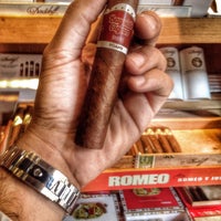 Photo taken at Bayside Cigars by Emre P. on 8/8/2015