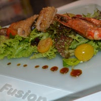 Photo taken at Fish &amp;amp; Fusion by Fish &amp;amp; Fusion on 12/23/2013