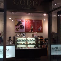 Photo taken at Godiva Chocolatier by Andrew D. on 1/20/2019