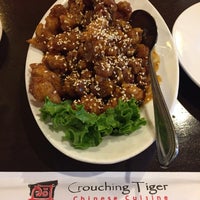 Photo taken at Crouching Tiger by Andrew D. on 5/3/2019