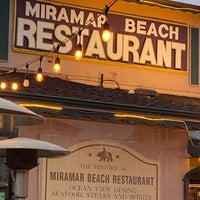 Photo taken at Miramar Beach Restaurant by Andrew D. on 8/24/2021