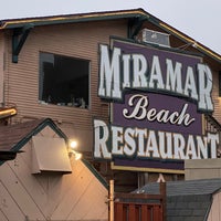 Photo taken at Miramar Beach Restaurant by Andrew D. on 8/24/2021