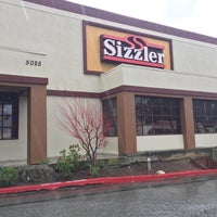 Photo taken at Sizzler by Andrew D. on 2/10/2019