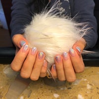 Photo taken at Sunset Nails by Angela G. on 1/11/2018