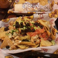 Photo taken at Moe&amp;#39;s by David A. on 6/30/2013