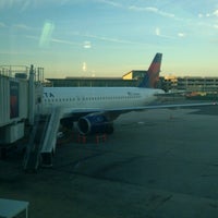 Photo taken at Gate D4 by Vee on 10/16/2012