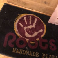 Photo taken at Roots Handmade Pizza by Joe C. on 11/27/2018