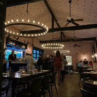 Photo taken at Purple Palm Restaurant by Jarod C. on 2/10/2020