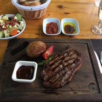 Photo taken at Özsar Steak House by Tuluğ B. on 8/8/2017