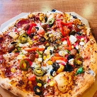 Photo taken at Domino&amp;#39;s Pizza by Tuncay D. on 3/23/2018