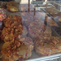 Photo taken at Spudnuts Donuts by Tam B. on 7/3/2015