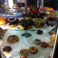 Photo taken at Voodoo Doughnut by Dave S. on 6/30/2015