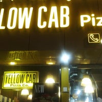 Photo taken at Yellow Cab Pizza by Habiba V. on 8/12/2014