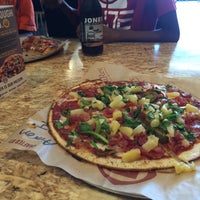 Photo taken at PizzaRev by Aaron G. on 5/21/2016