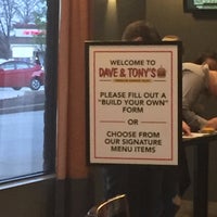 Photo taken at Dave &amp;amp; Tony&amp;#39;s Premium Burger Joint by Brett L. on 3/25/2017