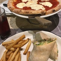 Photo taken at Trattoria Pizzarelli by Eve B. on 5/11/2019