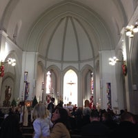Photo taken at St Thomas Aquinas Church by Elizabeth M. on 1/4/2014