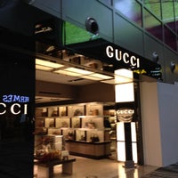 Photo taken at Gucci by Sean.T on 12/5/2012