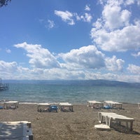 Photo taken at Ohrid Beach by Banu Ş. on 8/17/2015