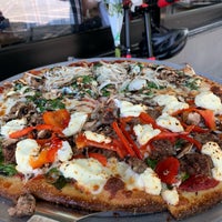 Photo taken at Blue Line Pizza by Ximena G. on 4/28/2019