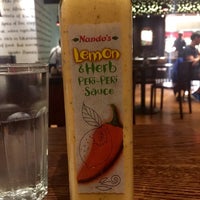 Photo taken at Nando&amp;#39;s by James G. on 11/6/2015