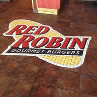 Photo taken at Red Robin Gourmet Burgers and Brews by Jonathan R. on 3/23/2013