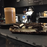 Photo taken at Rabbit Hole Coffee &amp;amp; Cakes by Burak E. on 12/15/2018