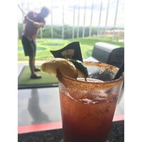 Photo taken at Topgolf by Ari N. on 7/3/2015