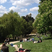 Photo taken at Parc des Buttes-Chaumont by Carolyn B. on 5/5/2013