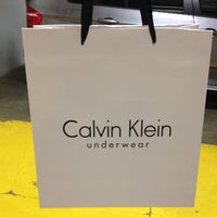 Photo taken at Calvin Klein Jeans by Ukka U. on 6/19/2014