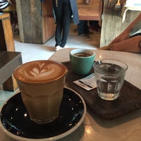 Photo taken at Roots Coffee Roaster by TiTle D. on 7/4/2015