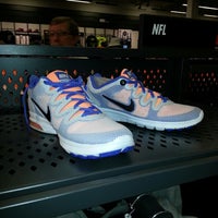 Photo taken at Nike Factory Store by Marie on 8/17/2013