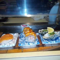 Photo taken at Sushi Maru by Carrie O. on 12/20/2012