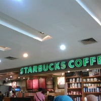 Photo taken at Starbucks Lounge Terminal 2E by Runes N. on 11/12/2012