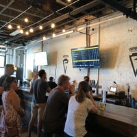 Photo taken at Empirical Brewery Taproom by James T. on 8/11/2018