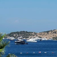 Photo taken at Knidos Beach by Murat A. on 8/25/2020