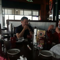 Photo taken at Wings &amp;amp; Rings by Stephanie M. on 4/28/2013