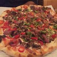 Photo taken at Howie&#39;s Artisan Pizza by Piyoosha G. on 12/12/2016