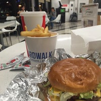 Photo taken at Boardwalk Fresh Burgers &amp;amp; Fries by Kari B. on 12/6/2015