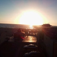 Photo taken at Surf City Hostel by Brenand D. on 10/9/2012