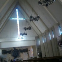 Inside of a church. Inside of a large, traditional catholic church with pews and