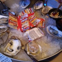 Photo taken at Shucks Fish House &amp;amp; Oyster Bar by Lahaina G. on 9/24/2014