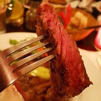 Photo taken at La Brasa Steakhouse by L.M. W. on 2/10/2015