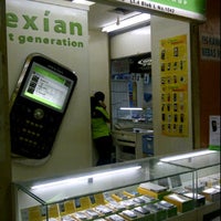 Photo taken at Nexian shop itc cempaka mas by deeach c. on 7/24/2012