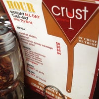 Photo taken at crust pizzeria by K L. on 6/9/2012