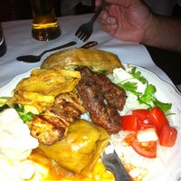 Photo taken at Old Town Serbian Gourmet Restaurant by Cynthia B. on 6/23/2012