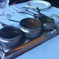 Photo taken at Royal Taj Indian Cuisine by Emme H. on 7/29/2012