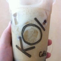 Photo taken at KOI Café by Cynthia L. on 3/18/2012